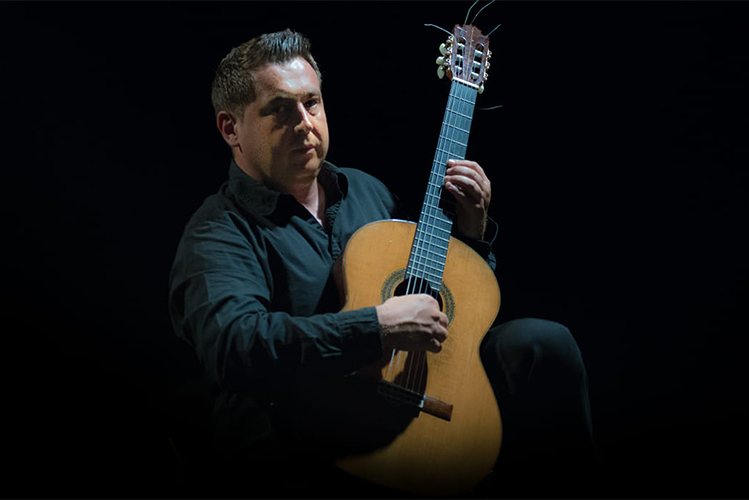 Elvis Sivčević with his guitar